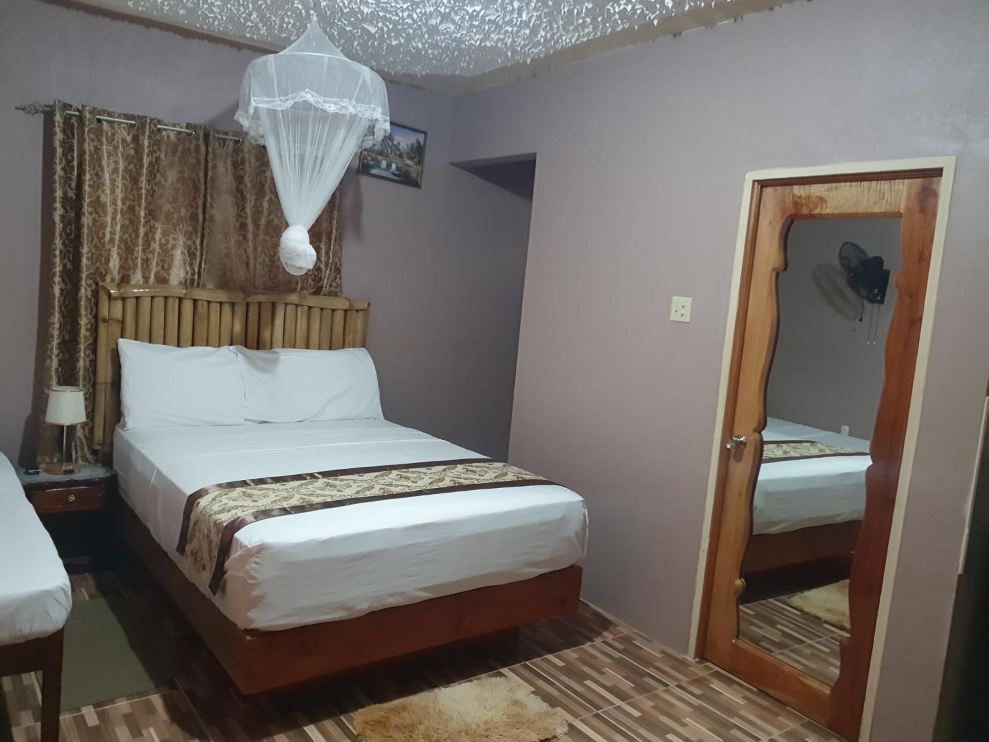 Mesmerize Guest House Порт-Антонио Номер фото